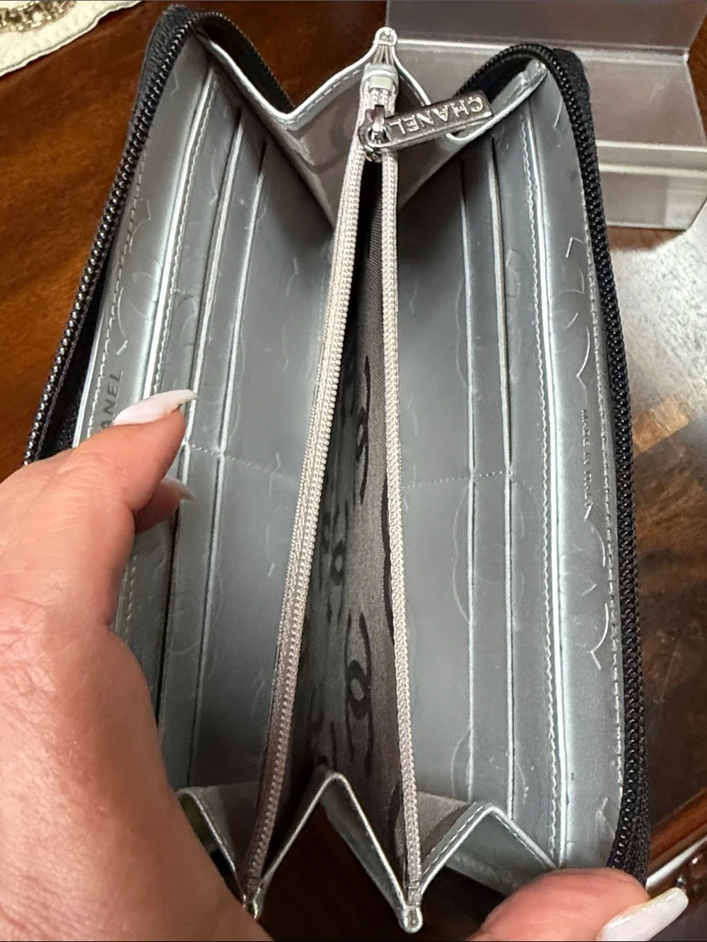CHANEL Black Quilted Zip Wallet with Silver CC Patch